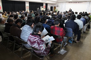 満員の講演会場