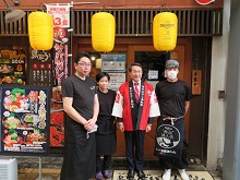 新型コロナウイルス感染予防対策協賛店へのステッカー交付式2
